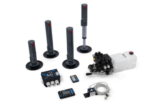The complete AMPLO levelling kit: four telescopic jacks, hydraulic power unit, control unit, display and remote